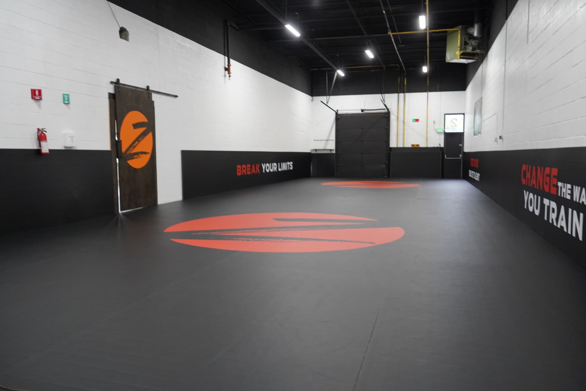 Z GRVTY mat area with the orange Z logo on the floor