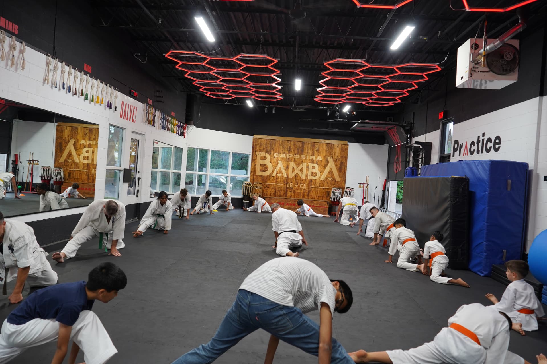 Full karate class warming up together on the Z GRVTY mats