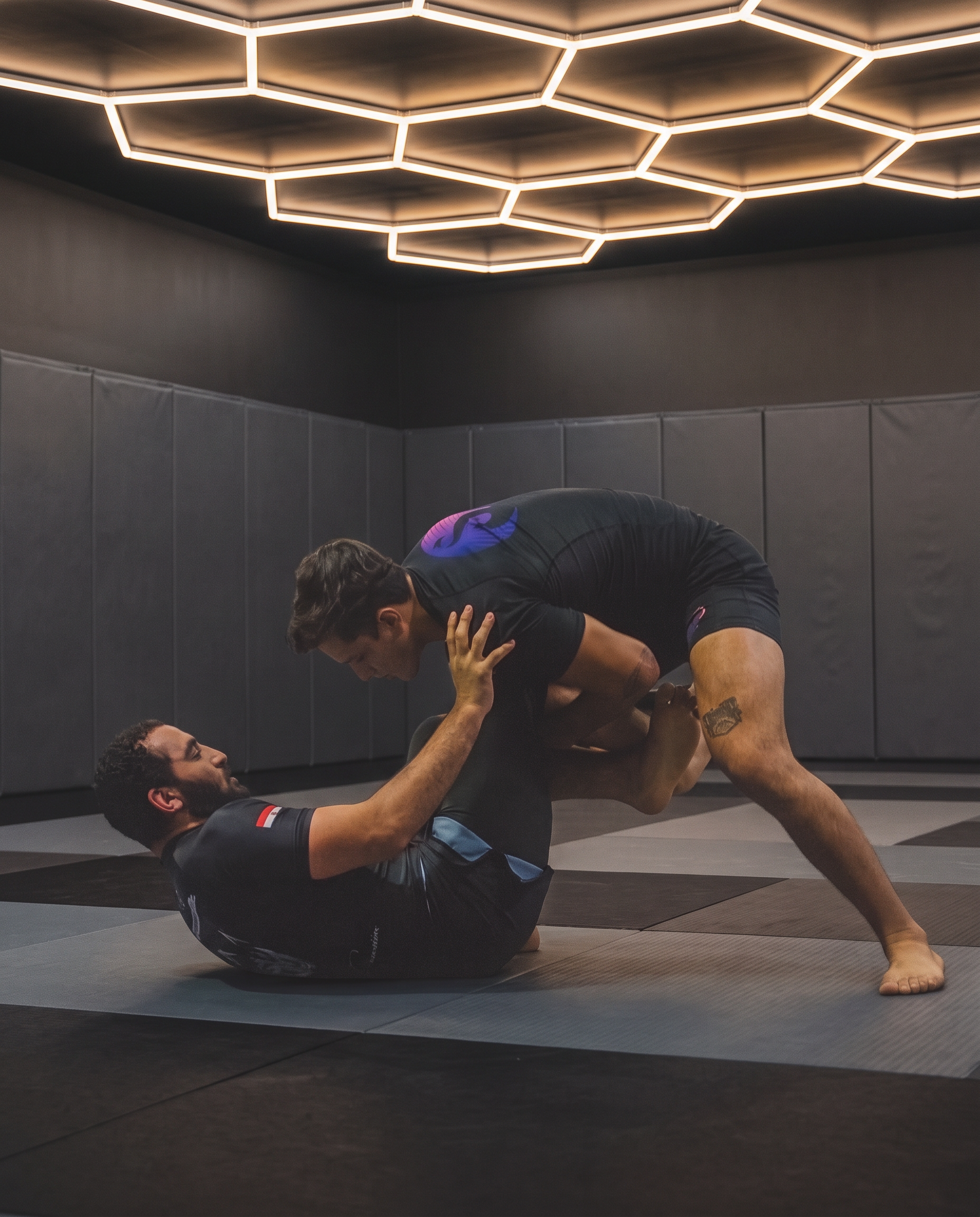Two Z GRVTY grapplers working guard passing during a BJJ session